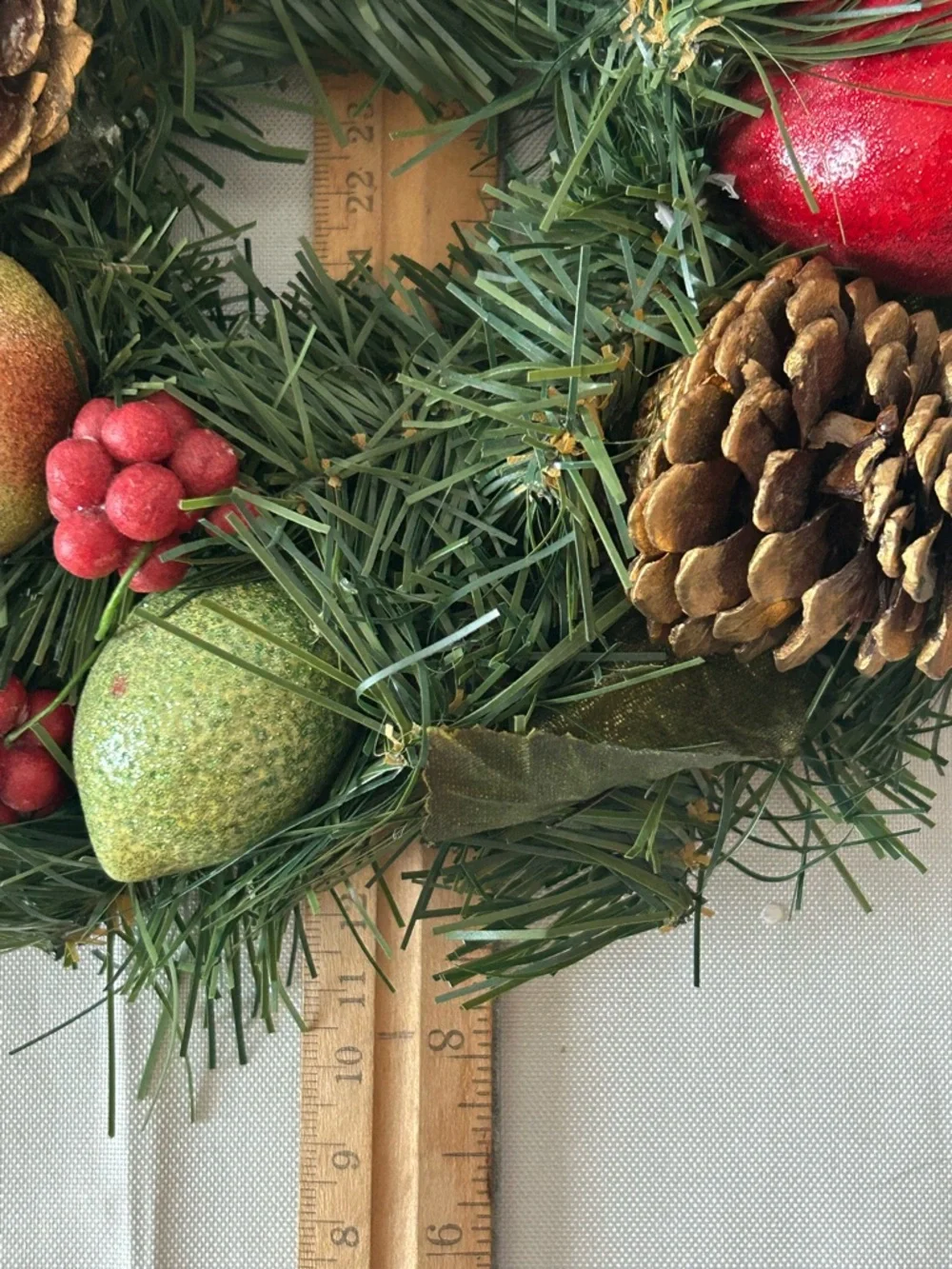VTG artificial wreath/candle ring w/faux fruit, pinecones, and red berries.